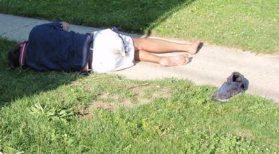 Tenant Passed-Out on Sidewalk