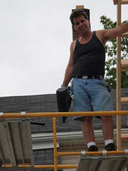 Rehabbing houses with scaffolding and picks